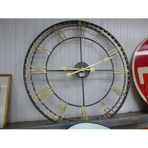 2260 - A metal skeleton wall clock