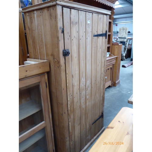 2282 - A rustic pine planked cupboard with three shelves