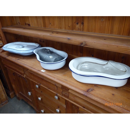 2284 - An assortment of enamel and porcelain bed pans with a bed warmer and a glass shewee