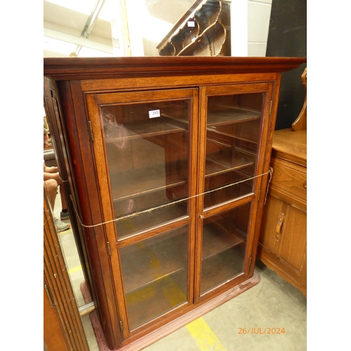 2321 - A 19th century oak and glazed two door