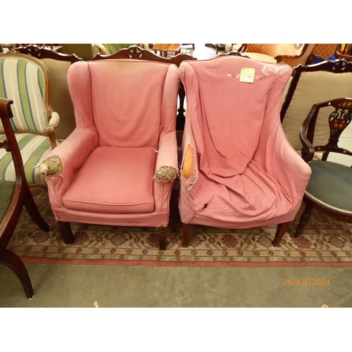 2334 - A circa 1900 oak winged armchair on square tapering supports and a 19th Century wingback armchair, r... 