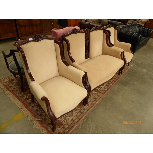 2337 - An Edwardian carved mahogany three piece suite with Calico upholstery