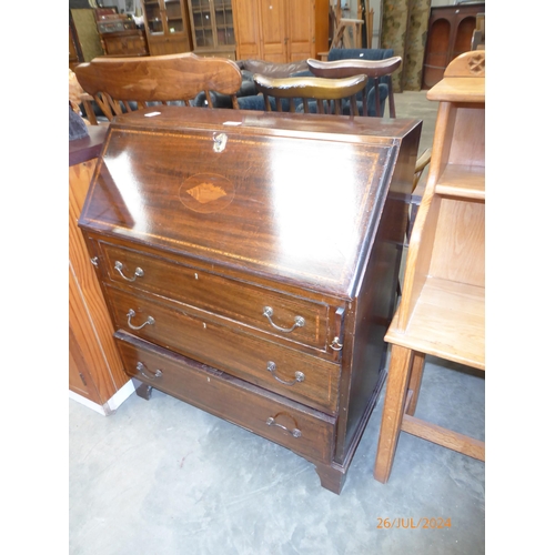 2381 - An Edwardian bureau, the fall front with central shell marquetry cartouche, three long drawers to fr... 