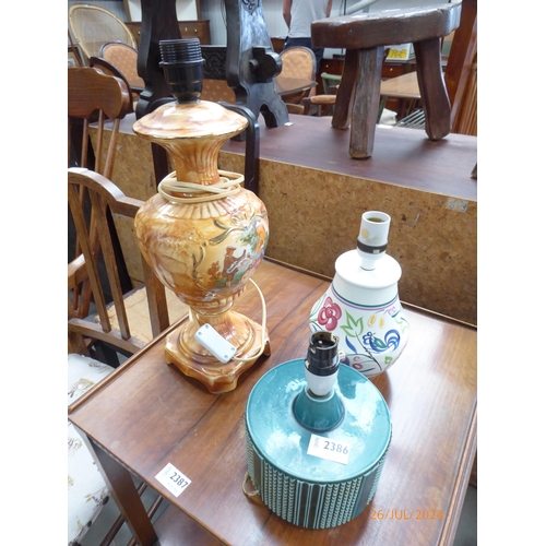 2386 - Two poole pottery table lamps and a classical lamp