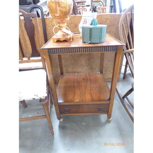 2387 - A 1940s walnut two tier side table with drawer