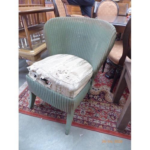 2398 - A Lloyd Loom chair, seat for re-upholstery