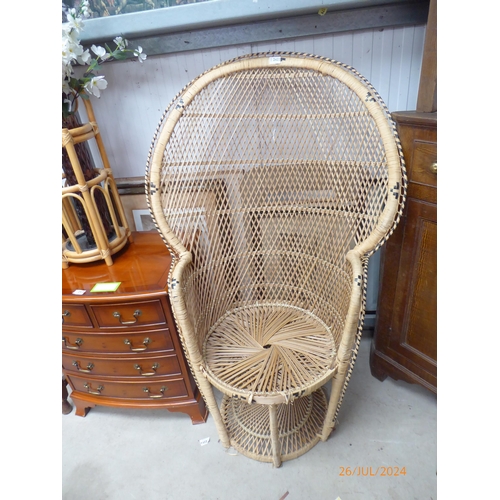 2422 - A wicker peacock chair