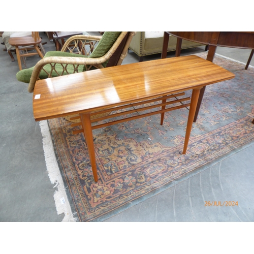 2437 - A mid century sappelle coffee table with undertier