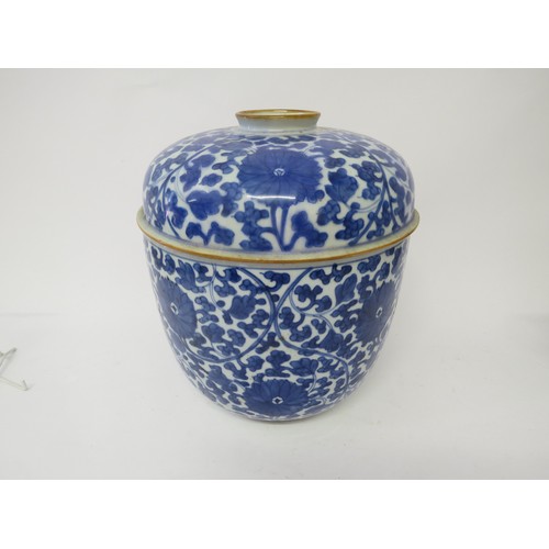 6003 - 19th Century Oriental lidded pot with floral design, 29.5cm tall and 25cm diameter