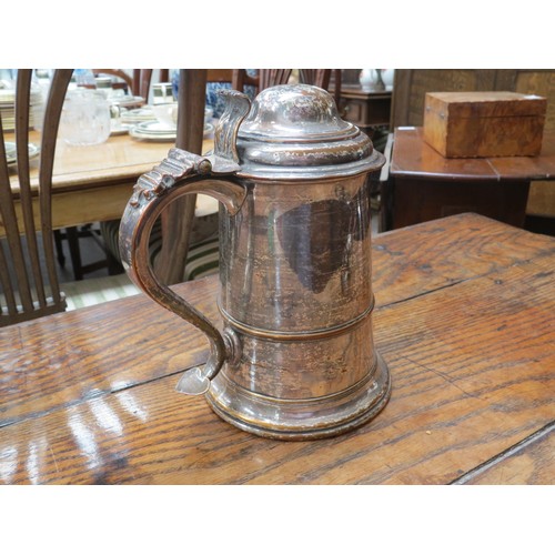 6103 - A Georgian plated tankard and ham bone holder, 21cm tall and 24cm long