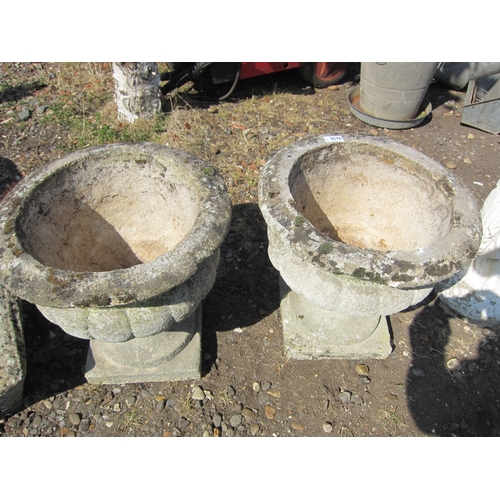 3576 - A pair of composition urns