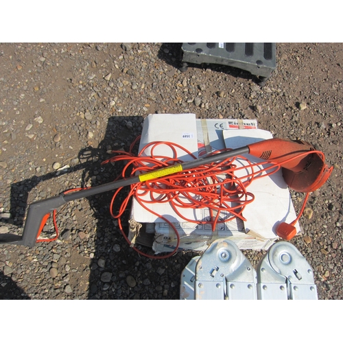 3589 - A boxed Einhell tile cutter and a strimmer.  DTI Failure: Please see information pages