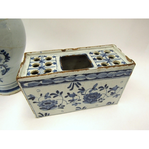 6004 - Delft wares including 18th Century flower brick/tulip holder and early 19th Century vase all with ar... 