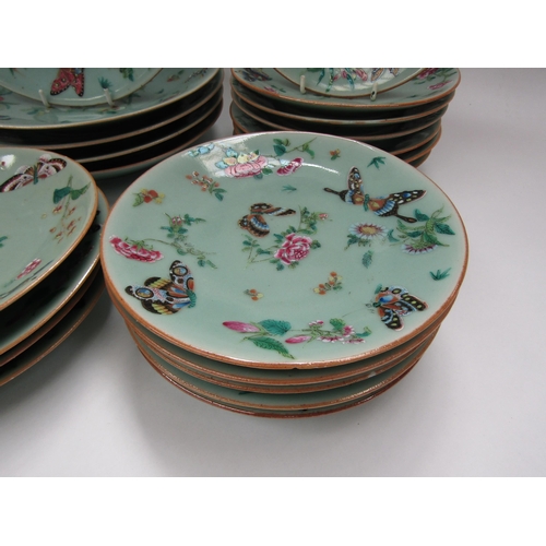 6009 - 19th Century Chinese export celadon green glazed plates with butterfly detail, 26cm and 20cm diamete... 