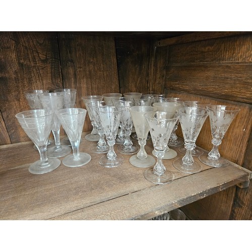 6055A - Victorian etched grape vine trumpet glasses with waisted stems, 13.5cm tall (17) and five others