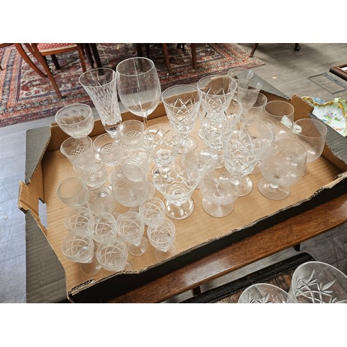 6107 - Suite of crystal glasses including champagne flutes, red wine, white wine, tumblers (71)