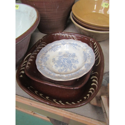 2011 - Two glazed slipware dishes, one cracked and a blue and white plate