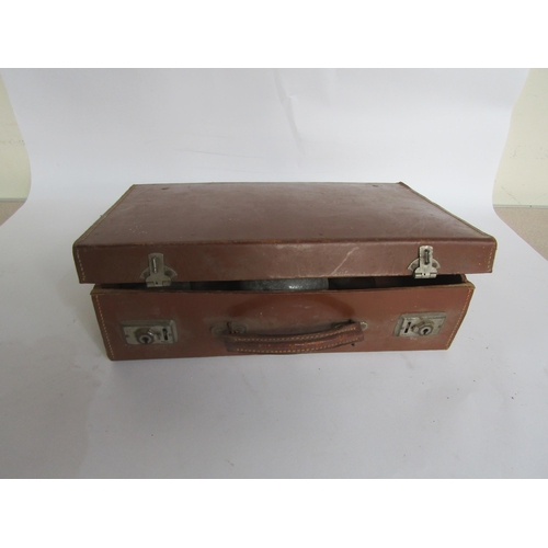 2021 - A leather case containing six lamp funels