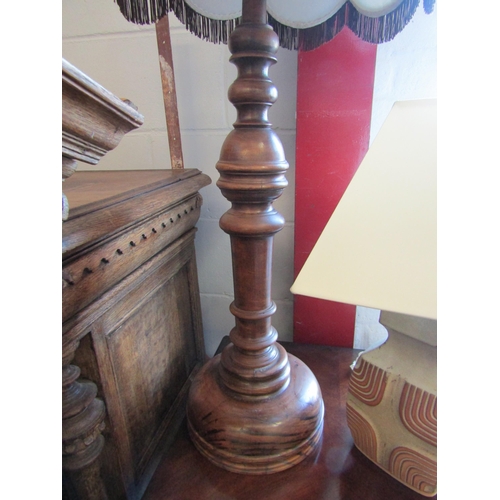 1004 - A studio pottery table lamp and a large turned walnut table lamp