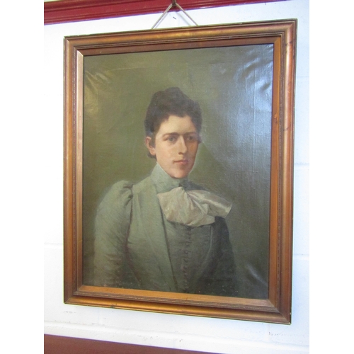 1013 - A Victorian oil on canvas portrait of a lady, small holes to corners of canvas, framed, 62.5cm x 49c... 