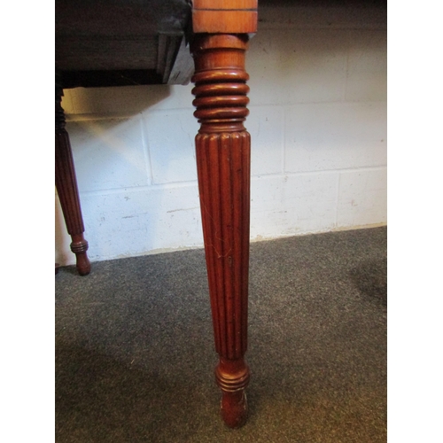 1018 - A Regency mahogany sideboard, shaped front with two central drawers and a pair of convex drawers on ... 