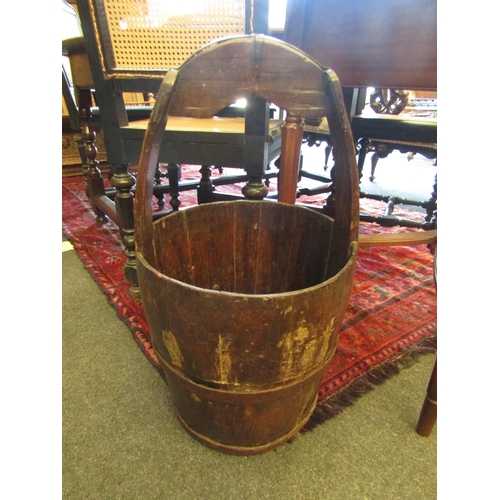 1031 - A Chinese well bucket. 63cm height