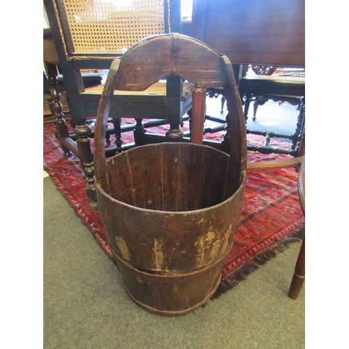 1031 - A Chinese well bucket. 63cm height