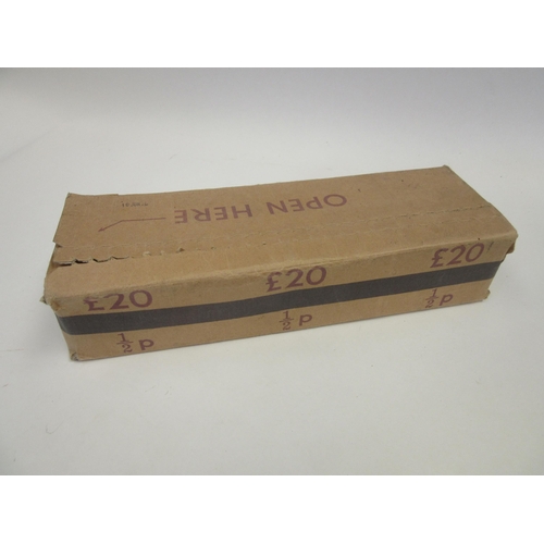 1404 - A sealed box containing £20 worth of half penny pieces