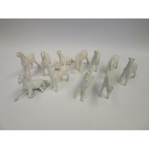 1424 - A quantity of ceramic white horse figures (11)