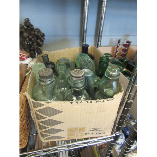 1448 - A box of brown, clear and Bristol blue glass bottles to include 