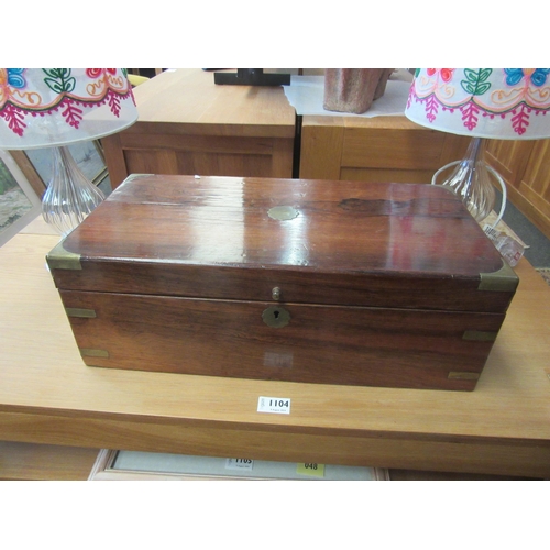 1103 - A Victorian mahogany campaign style writing box with brass mounts, tooled brown leather insert