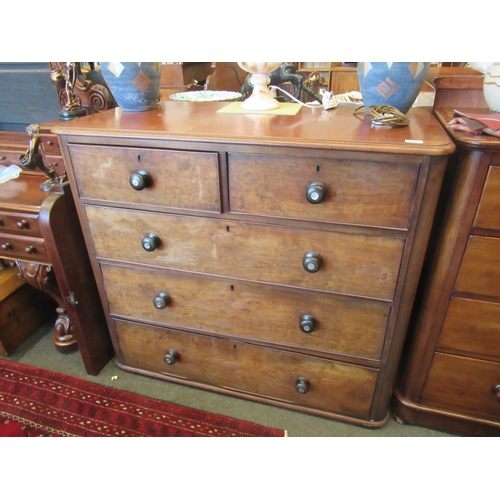 1142 - A 19th Century mahogany two over three chest of drawers with mother-of-pearl bun handles, rounded co... 