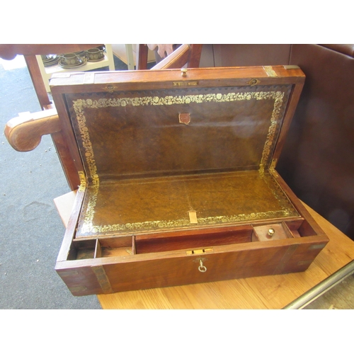 1161 - A Victorian campaign style writing box, brass inlaid, with key