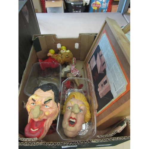 1198 - A mixed group of toys and collectables including Margaret Thatcher and Ronald Reagan caricature pupp... 