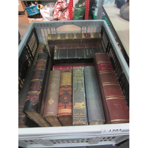 1203 - A box of assorted leather bound books, etc. including 