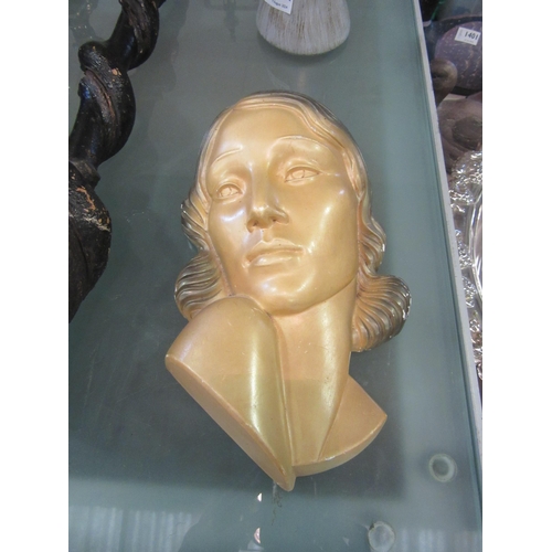 1205 - An Art Deco plaster wall mask, 27cm tall