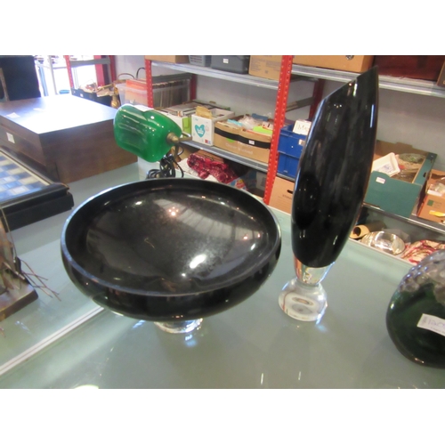 1208 - A black Art glass bowl on clear base, 27cm diameter and a similar vase, marked to base, 36cm tall (2... 