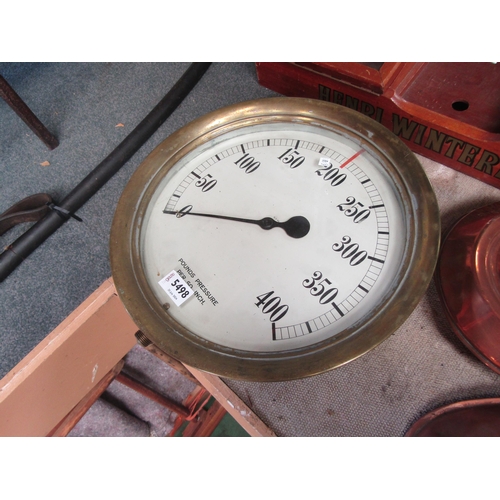 2223 - A large brass cased pressure gauge