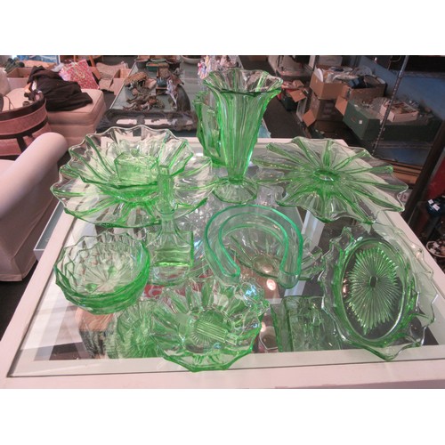 1546 - A large quantity of uranium glass wares incl. mustard pot, cheese dish, plates and bowls, vase, ice ... 