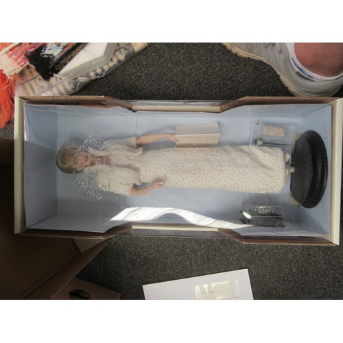 1557 - A Franklin Mint Princess Diana commemorative doll, boxed, with commemorative plate, fans etc.