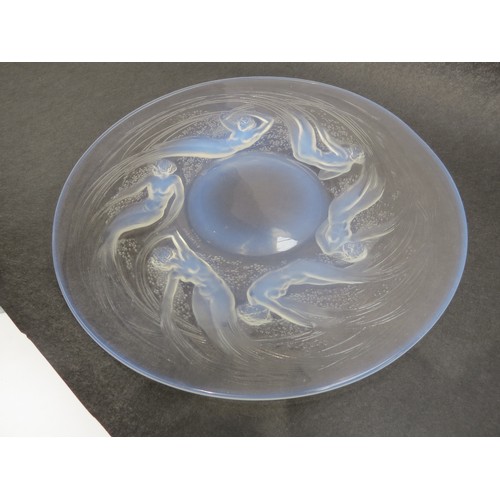 6693 - Rene Lalique an Ondines opalescent glass plate, Circa 1921, No 3003, depicting six opalescent sea sp... 