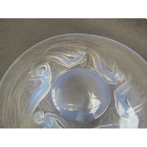 6693 - Rene Lalique an Ondines opalescent glass plate, Circa 1921, No 3003, depicting six opalescent sea sp... 