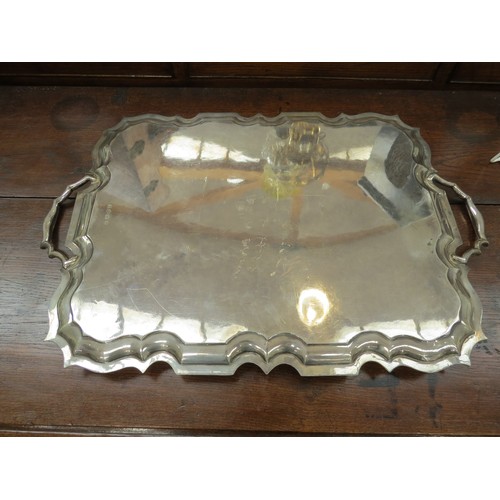 6692A - A Thomas Bradbury and Sons silver drink's tray, piecrust edge, engraved presentation to centre, Lond... 