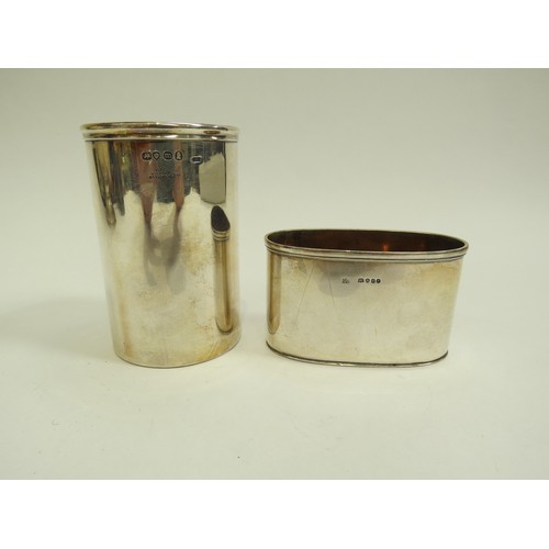 6688 - An Archibald Douglas silver cylindrical container with gilt interior and a silver oval container (pr... 