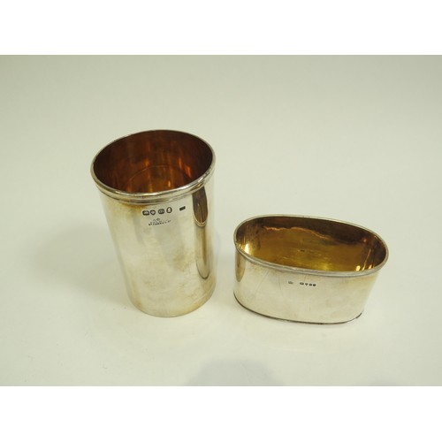 6688 - An Archibald Douglas silver cylindrical container with gilt interior and a silver oval container (pr... 