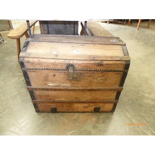 2013 - A 19th Century pine metal-bound dome top coaching trunk