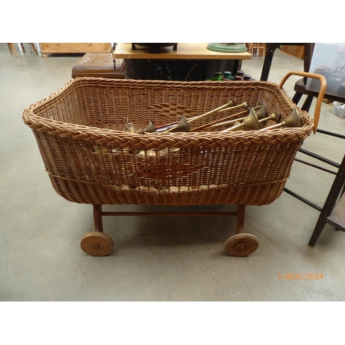 2033 - A mid 20th Century wicker push a-long cart/pram