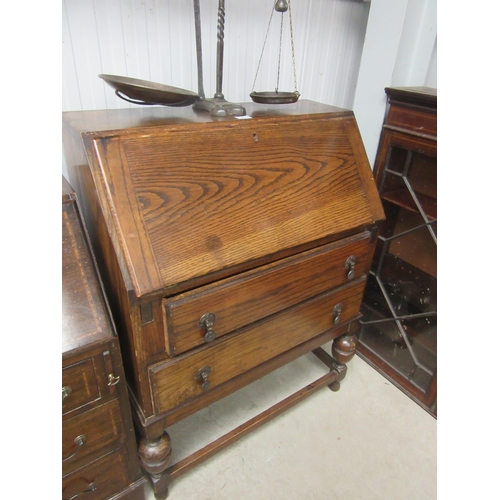 2170 - A 1940's oak two drawer bureau