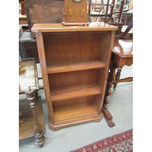 2187 - A Victorian inlaid walnut 3-tier bookcase and an inlay mantle clock