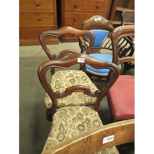 2206 - A pair of Victorian rosewood chairs